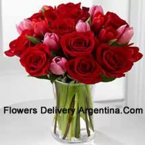 12 Red Roses And 6 Pink Tulips With Some Seasonal Fillers In A Glass Vase