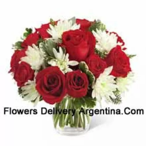 This Bouquet?is a charming display of holiday beauty and winter warmth. Rich red roses and spray roses pop against white chrysanthemums, assorted Christmas greens and eucalyptus, arranged in a round clear glass vase to create a gift that will spread the goodwill of the season to your special recipient. (Please Note That We Reserve The Right To Substitute Any Product With A Suitable Product Of Equal Value In Case Of Non-Availability Of A Certain Product)