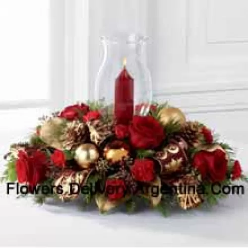 The Golden Christmas Centerpiece is the perfect display of holiday warmth and cheer to gather your friends and family together. Bright red roses and mini carnations are gorgeously arranged with holiday greens and seeded eucalyptus accented with golden pinecones, gold and copper glass balls, and burgundy and gold wired ribbon encircling a glass hurricane. (Please Note That We Reserve The Right To Substitute Any Product With A Suitable Product Of Equal Value In Case Of Non-Availability Of A Certain Product)